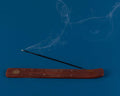 Incense Burning on Wooden Star Holder